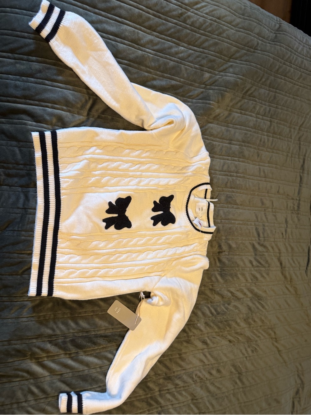 Women’s Cream Cable Knit Sweater with Black Trim and Motif